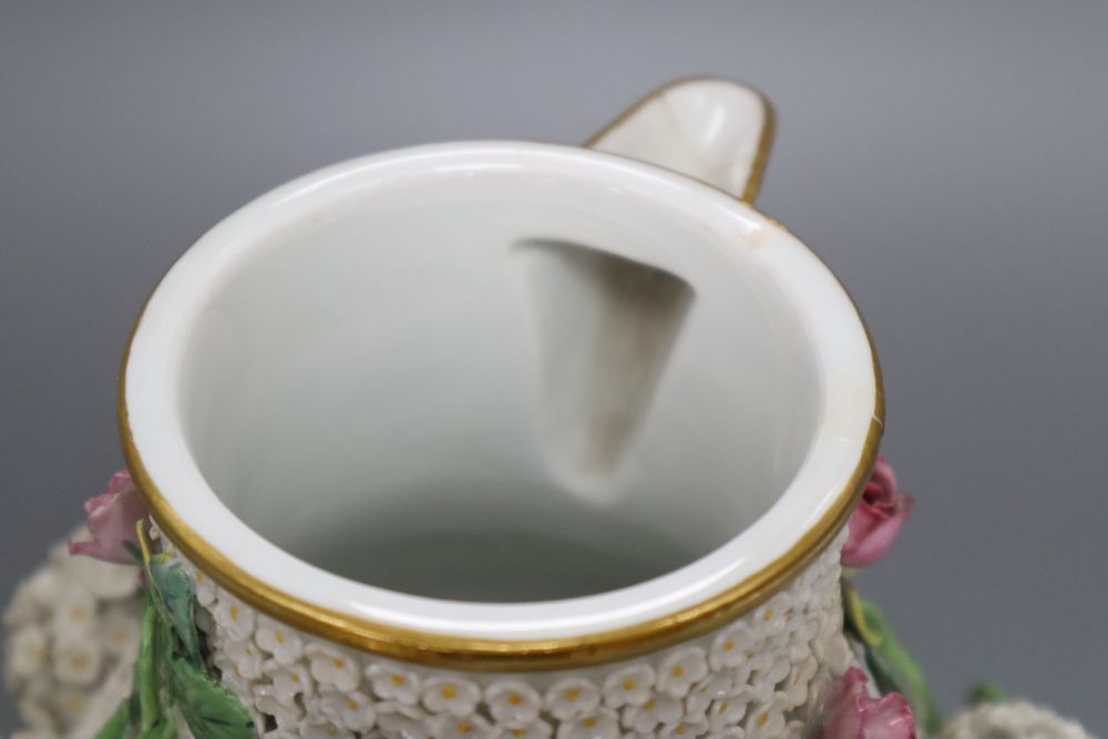 A Meissen floral encrusted hot water jug and cover, height 26cm